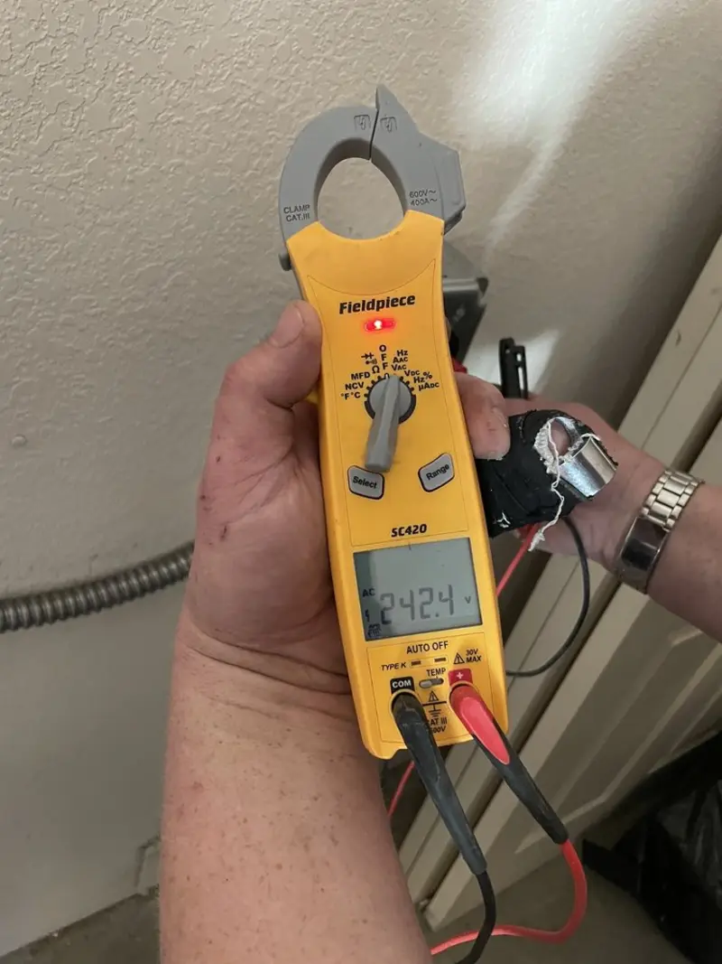 Voltage testing with clamp meter during Generator Installation in Bellingham